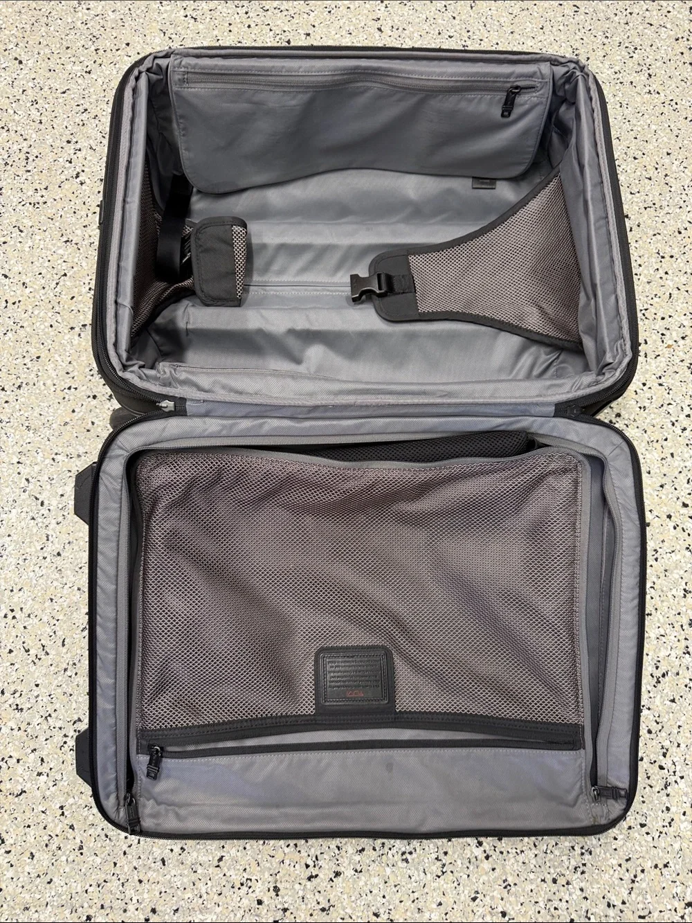 Tumi Black Carry-On with Brown Leather Accents